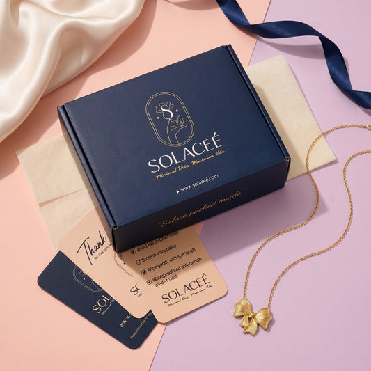 Twinkle Tie – Gold Bow Pendant Necklace