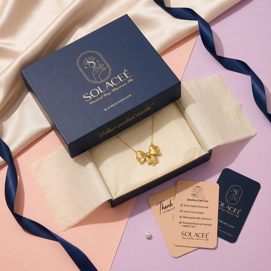 Twinkle Tie – Gold Bow Pendant Necklace