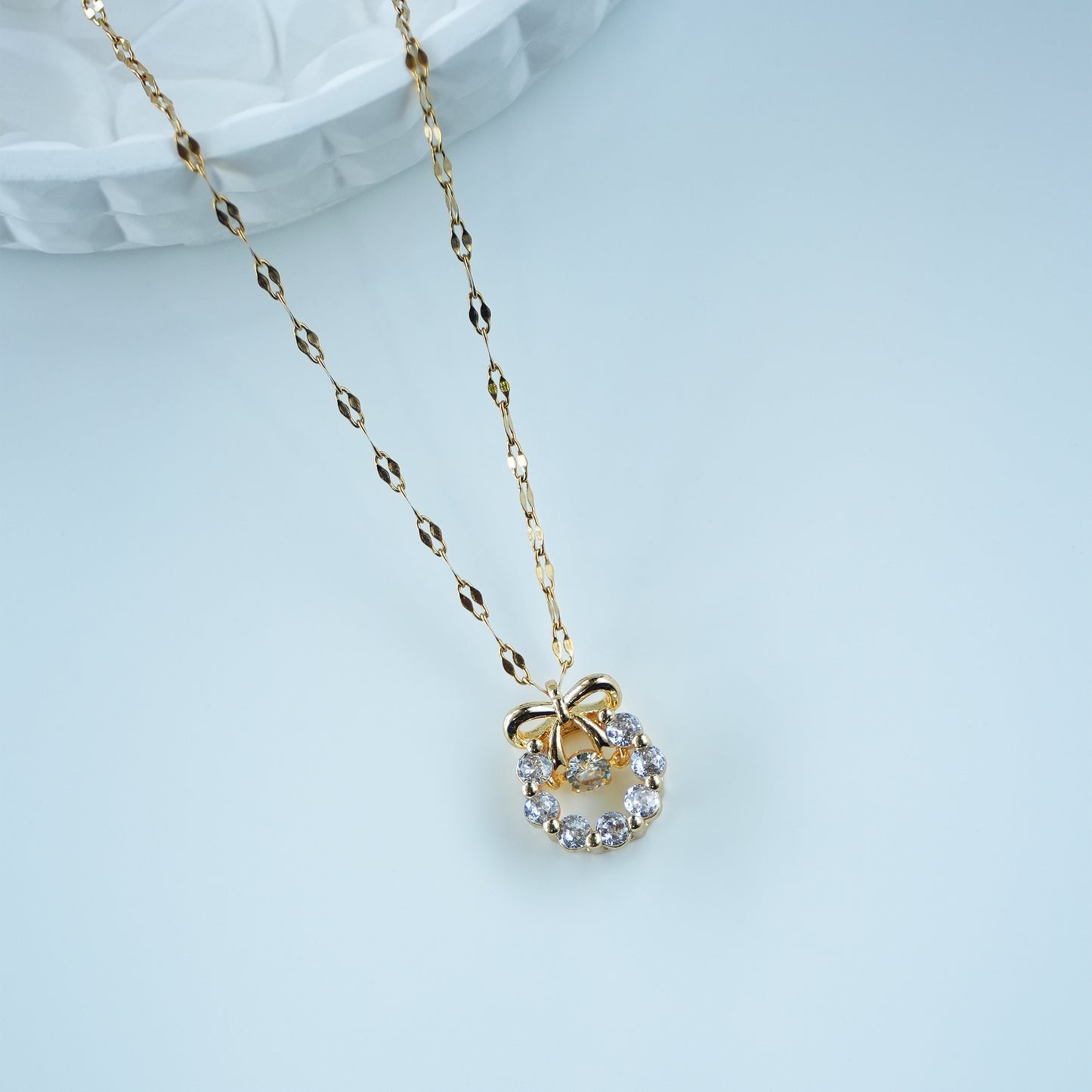 Golden Grace – Crystal Bow Circle Necklace