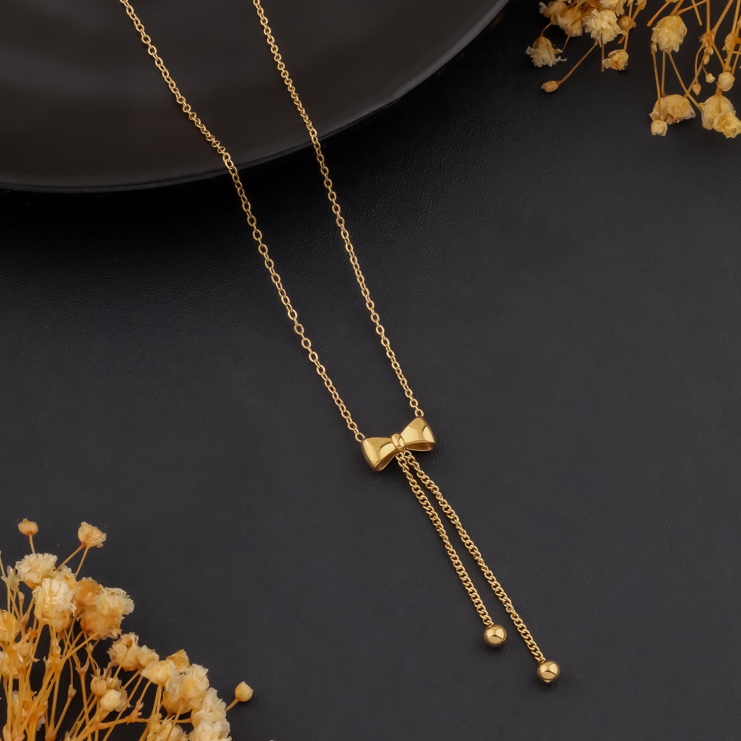Ribbonfall – Dangling Bow Necklace
