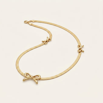 TrioCharm – Triple Bow Necklace