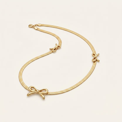 TrioCharm – Triple Bow Necklace