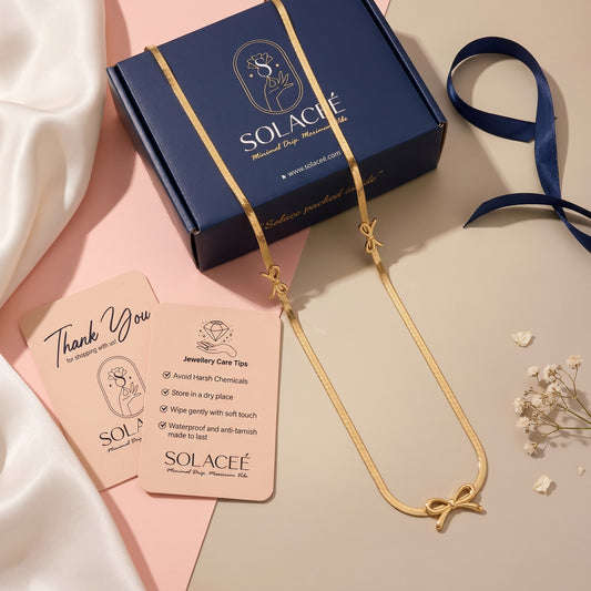 TrioCharm – Triple Bow Necklace