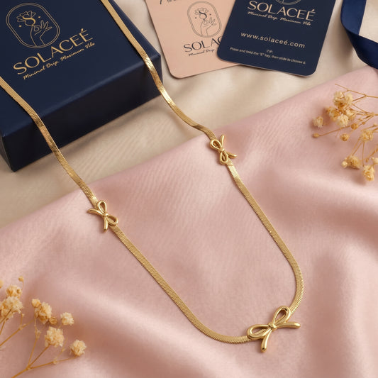 TrioCharm – Triple Bow Necklace