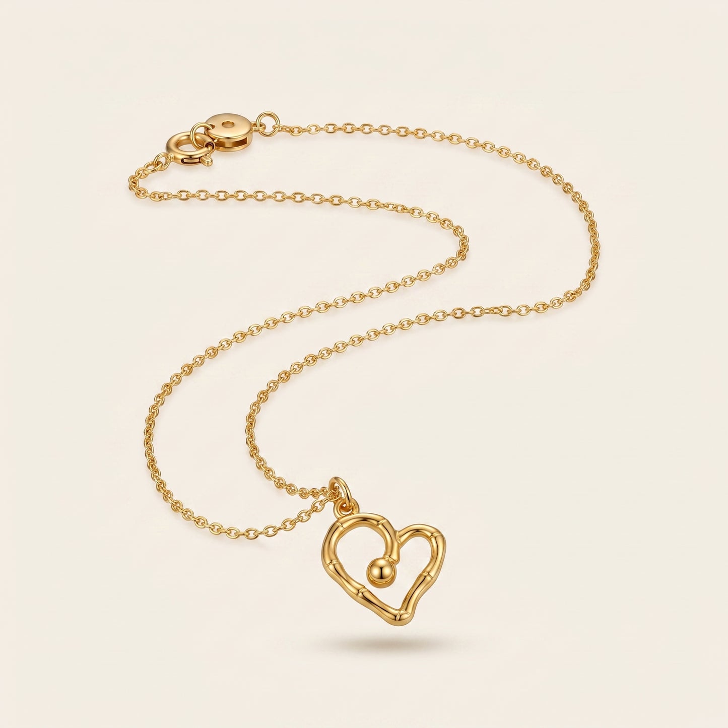 Golden Pulse – Sculpted Heart Necklace