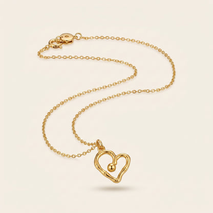 Golden Pulse – Sculpted Heart Necklace
