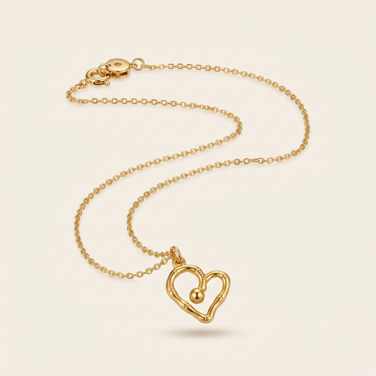 Golden Pulse – Sculpted Heart Necklace