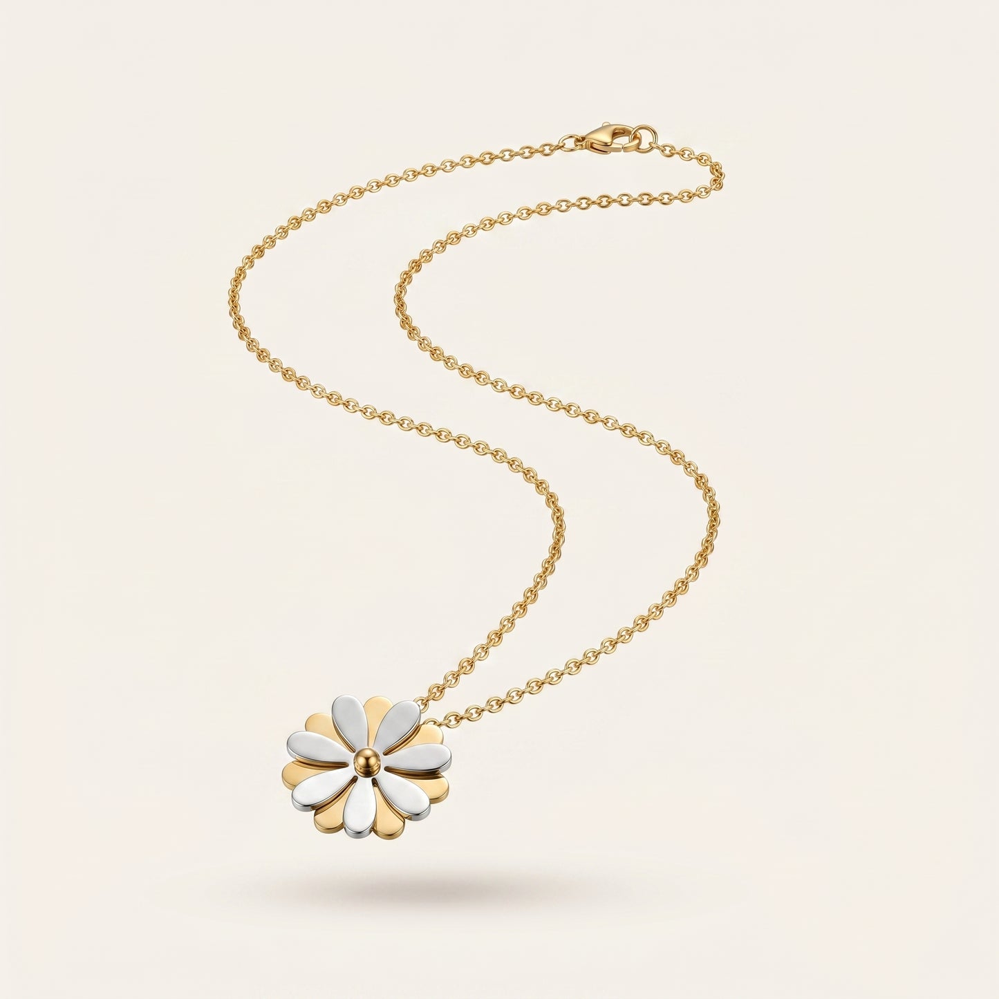 Golden Whirl – Rotating Daisy Pendant Necklace