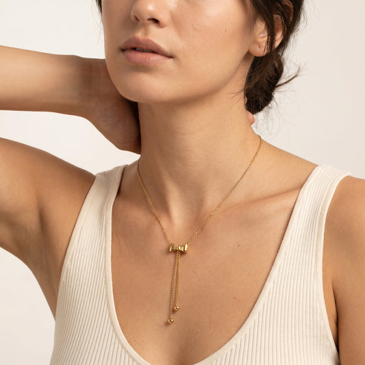 Ribbonfall – Dangling Bow Necklace